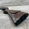 Handgun replica with wooden grip, commonly associated with Cold War memorabilia and security at Checkpoint Charlie in Berlin. Ideal for collectors interested in historic Berlin border crossing artifacts.